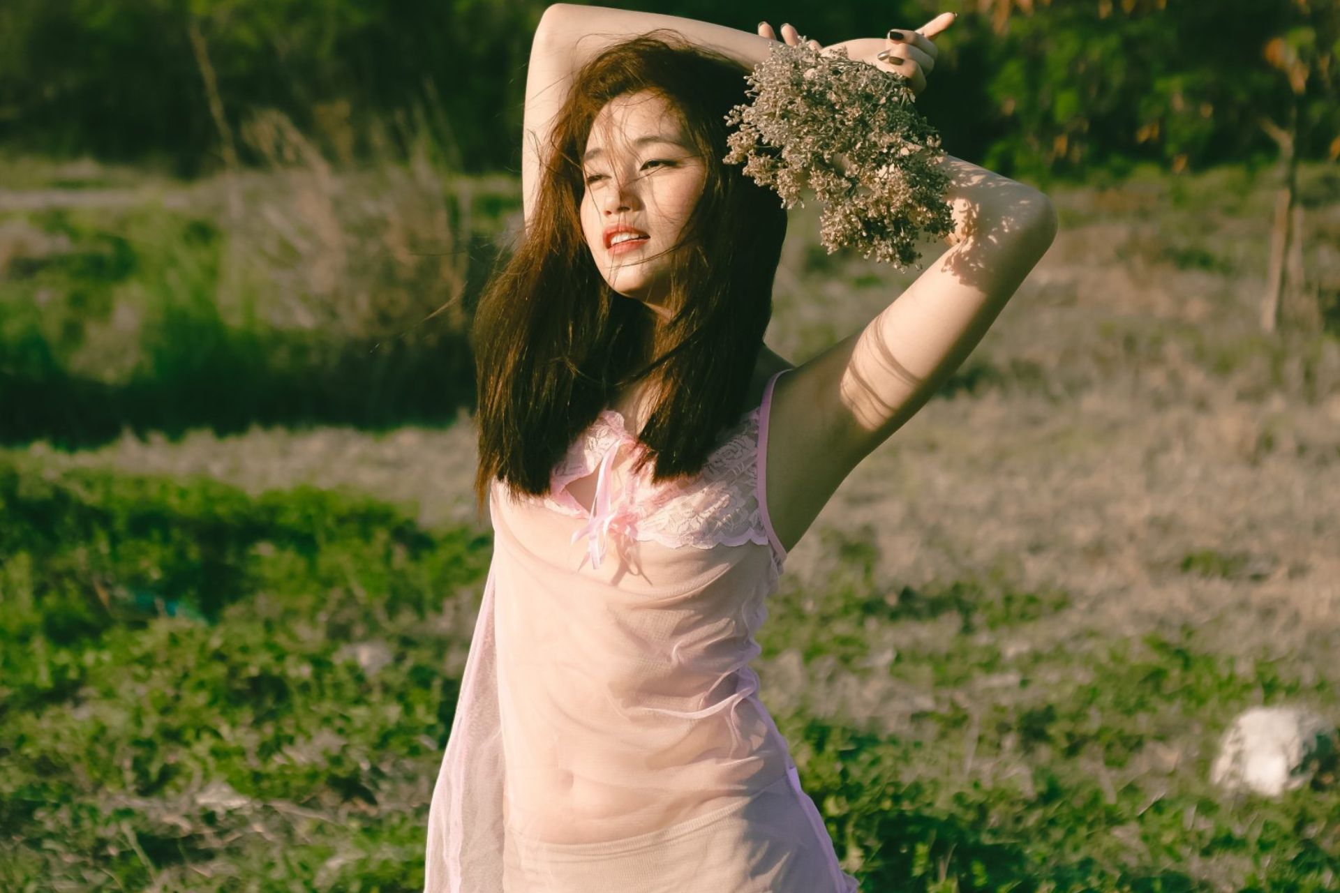 beautiful-korean-girl-enjoying-sunbath-in-greenary.