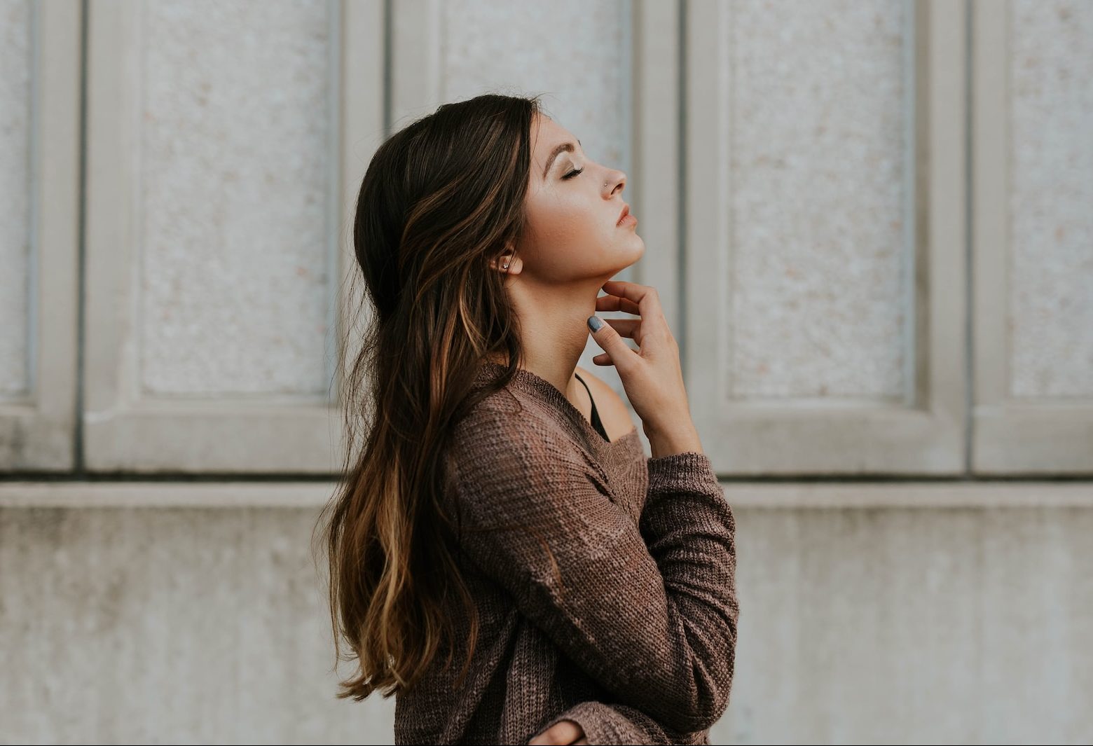 woman wearing brown top