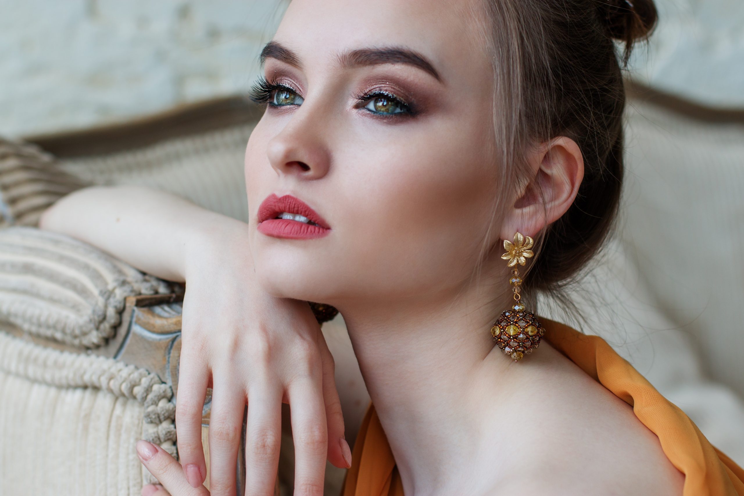 Beautiful Irish Girl wearing orange top