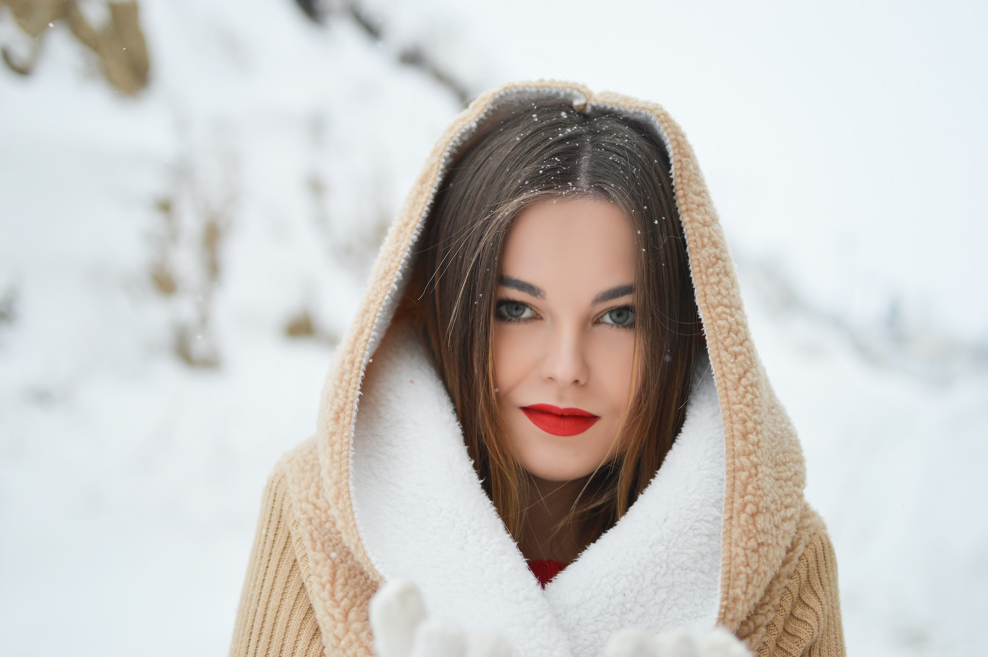 girl wearing white jerkin standing in ice area