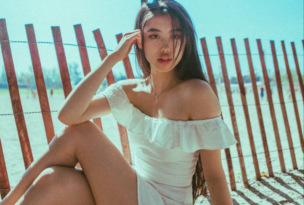 korean girl wearing a white top