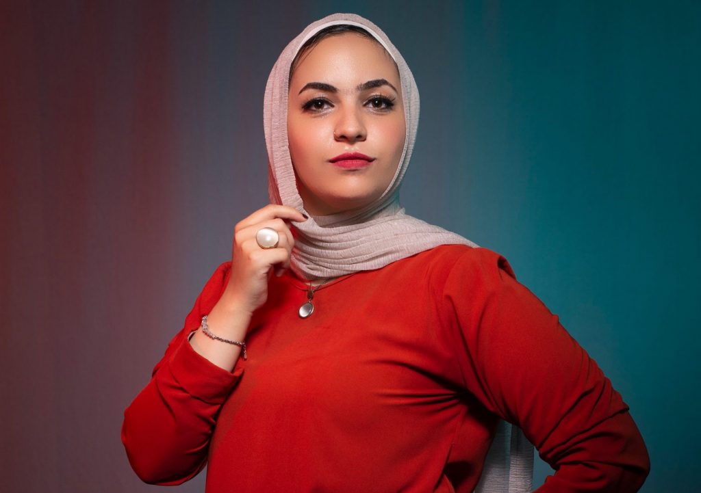 muslim girl wearing hijab and red punjabi
