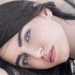 Girl is showing snail mucin benefits on her skin