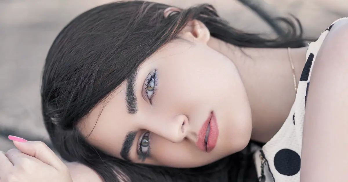 Girl is showing snail mucin benefits on her skin
